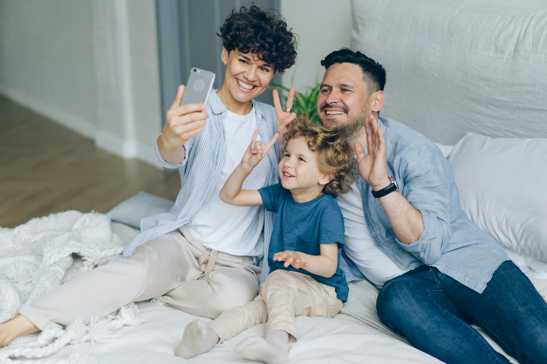 Happy family taking a selfie at home