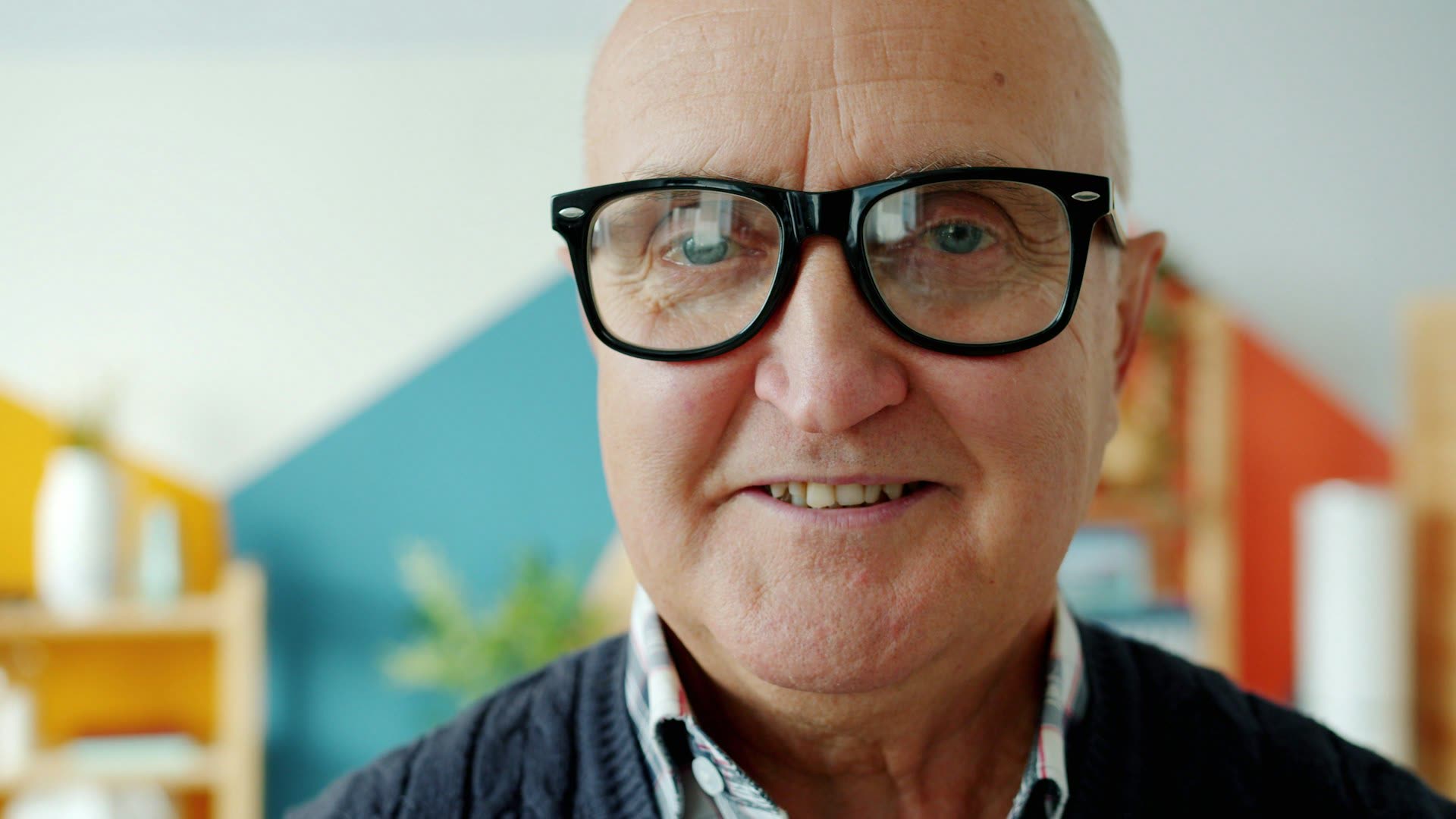 Smiling older man with glasses