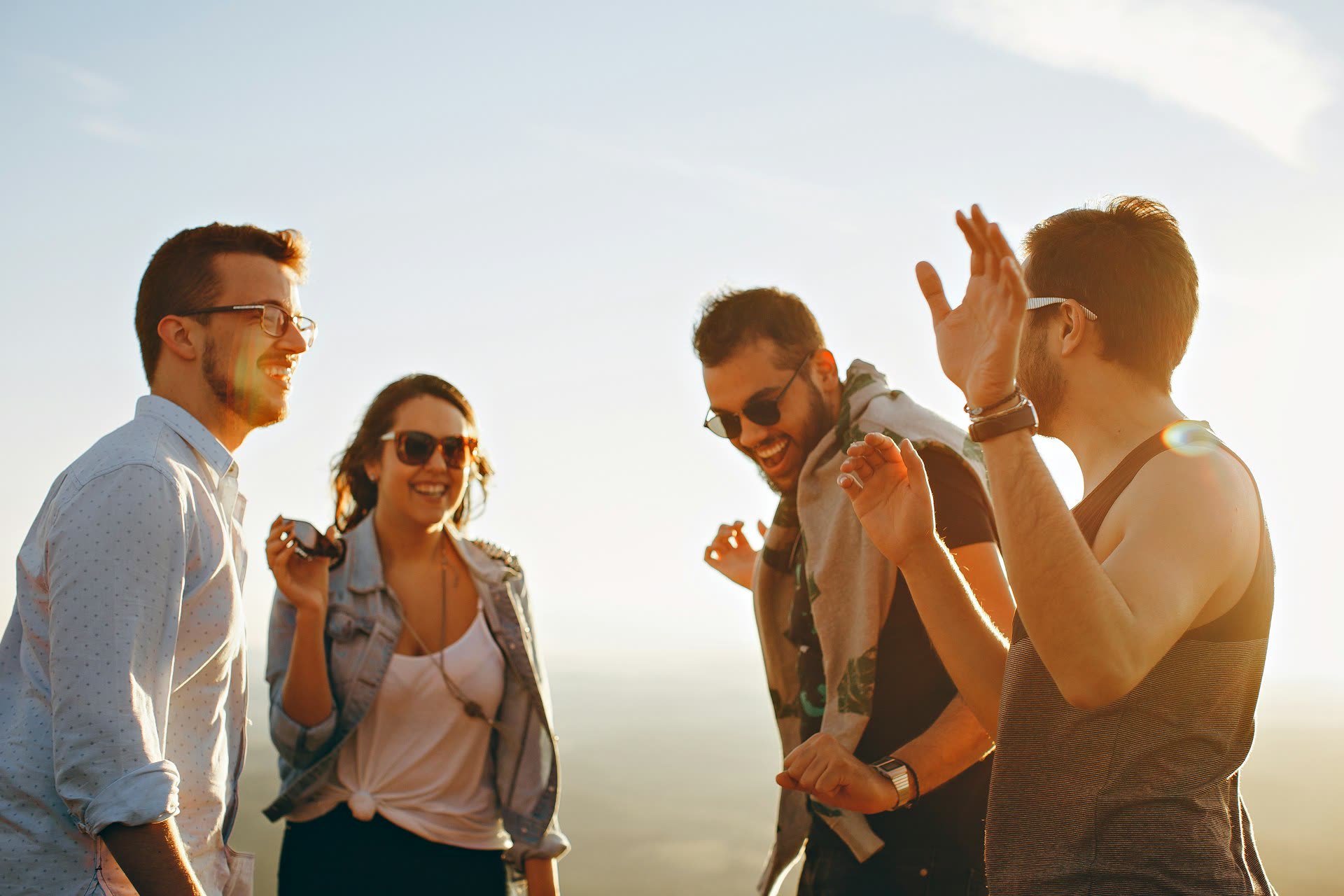 Friends laughing together outdoors